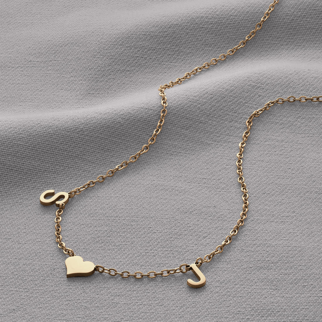 ONE HEART INITIAL NECKLACE