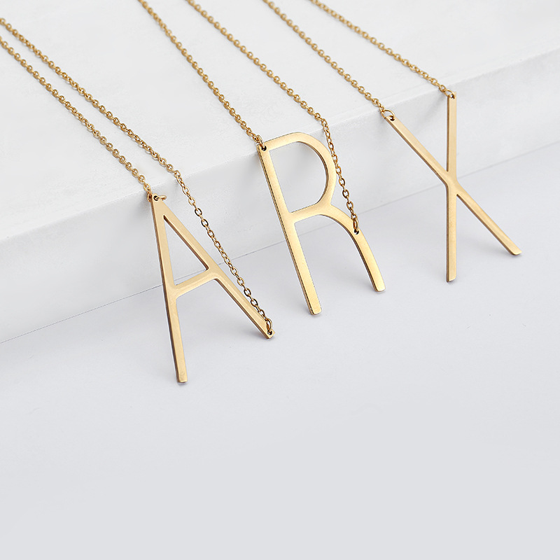 GOLDTONE MONOGRAM NECKLACE