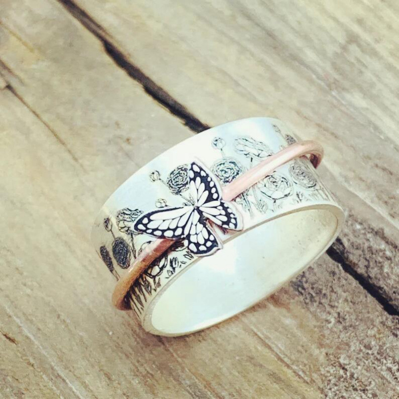 Rotatable butterfly ring